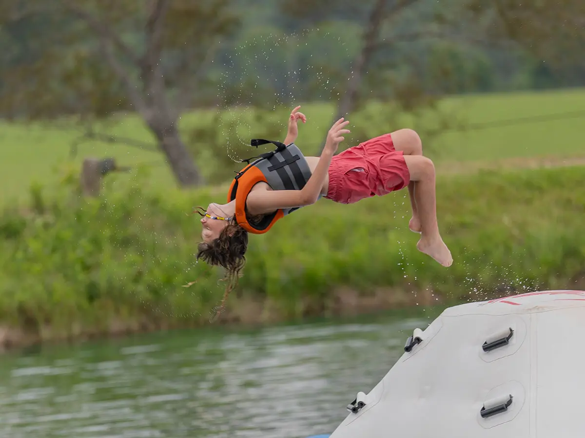 Campers enjoying fun swim at the Brookhill Ranch lake